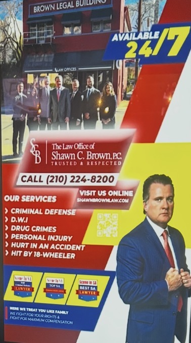 Shawn C. Brown law office advertisement shown on a vending screen